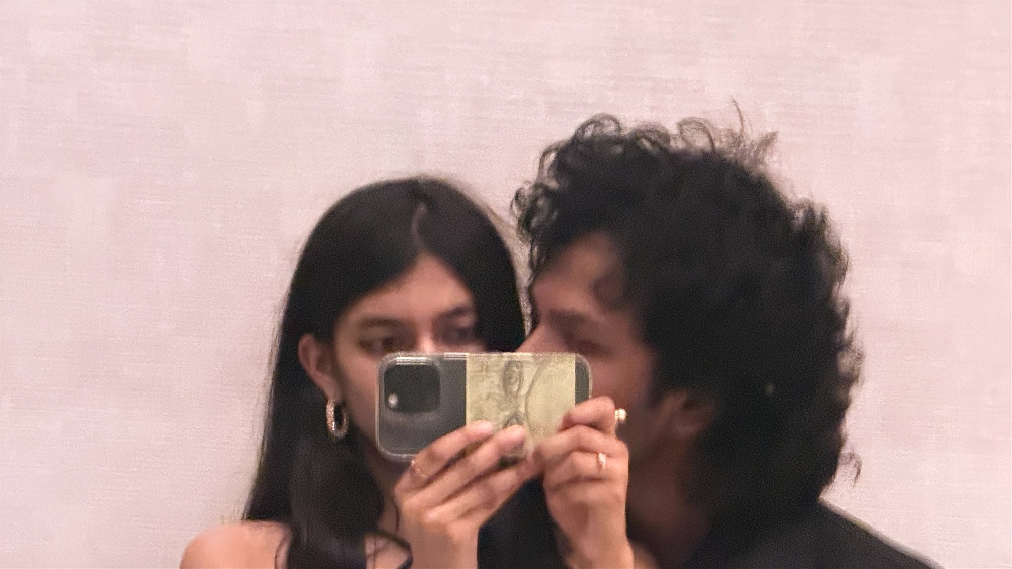 A close prom-night mirror photo together