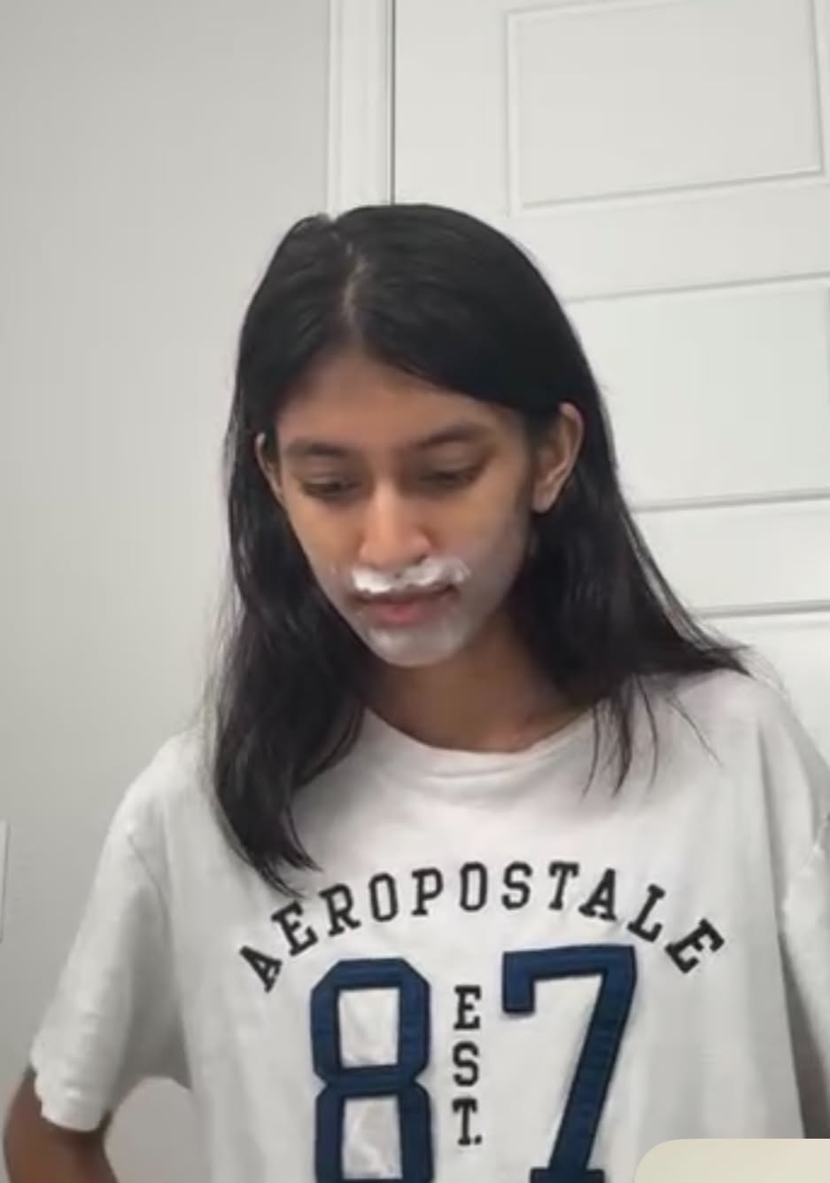 Anjani with a playful cream mustache